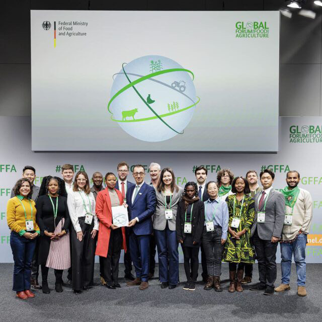 Youth Farmers presenting declaration to the German Minister of Food and Agriculture 